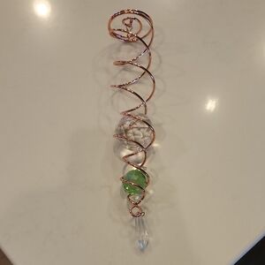 Elegant Copper Spiral Ornament with Crystal Accents